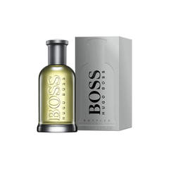 perfume de marca higo boss, contiene 100 ml y su empaque es de color gris, es un perfume unisex